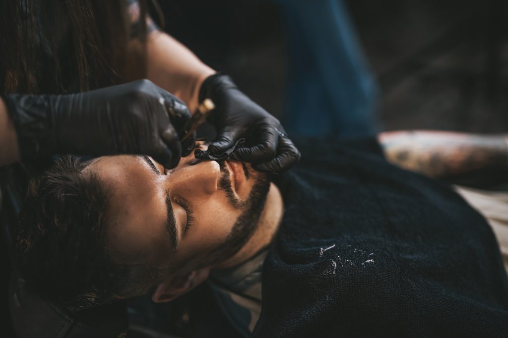 Old fashioned and stylish cutting in luxurious barbershop